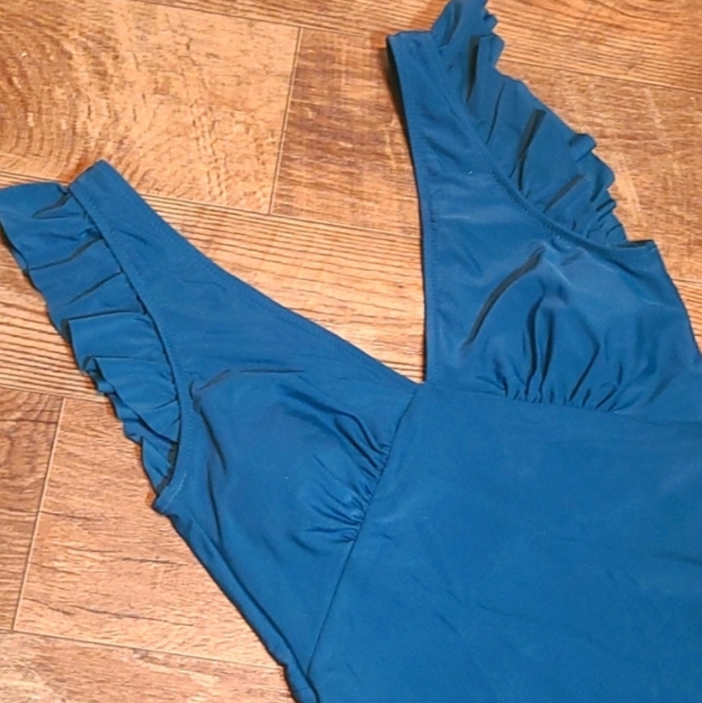 NWT! One Piece Stylish Teal Swimsuit